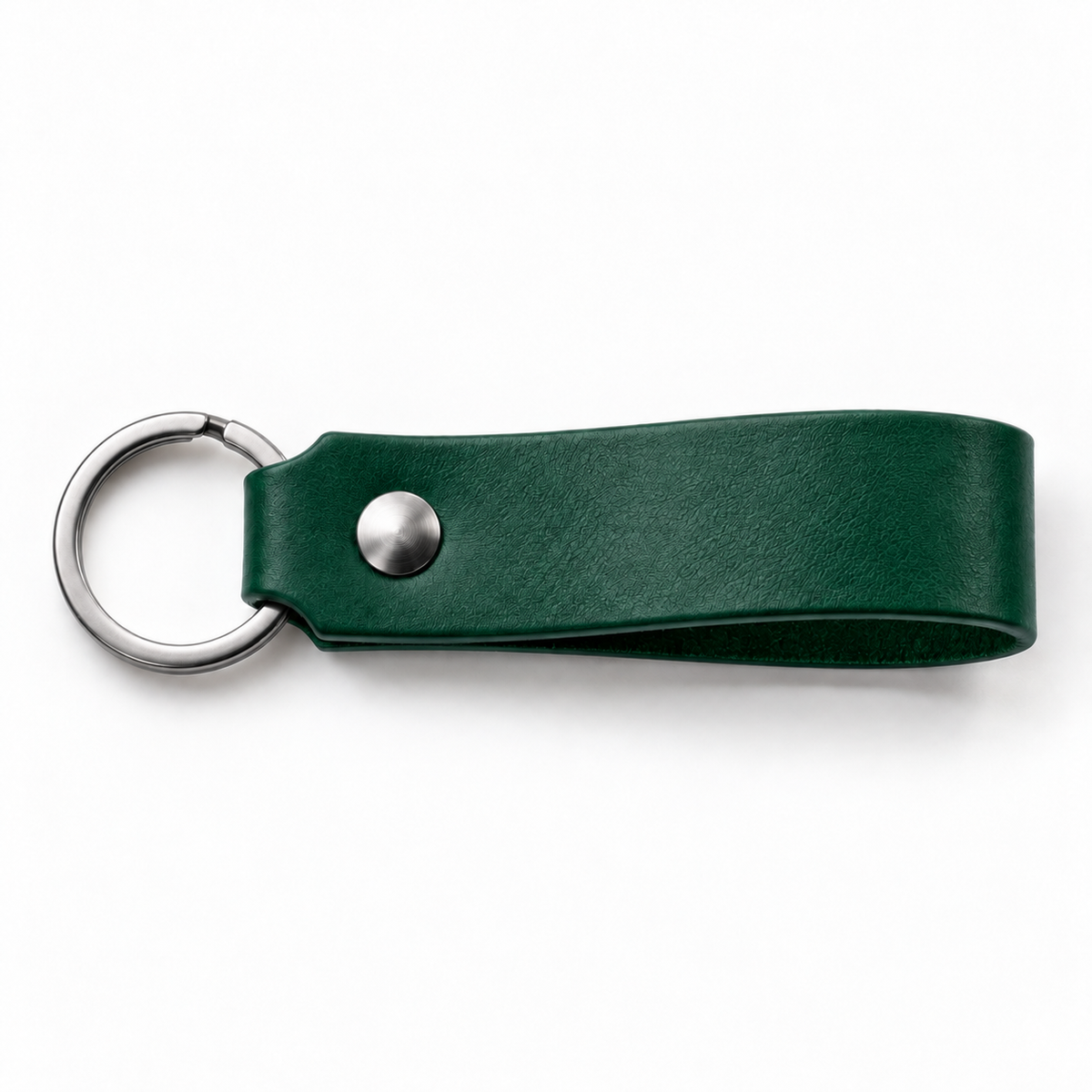 SANTJAG personalized leather keychain in Forest Green leather, unengraved, with silver-tone key ring and rivet on a white background.