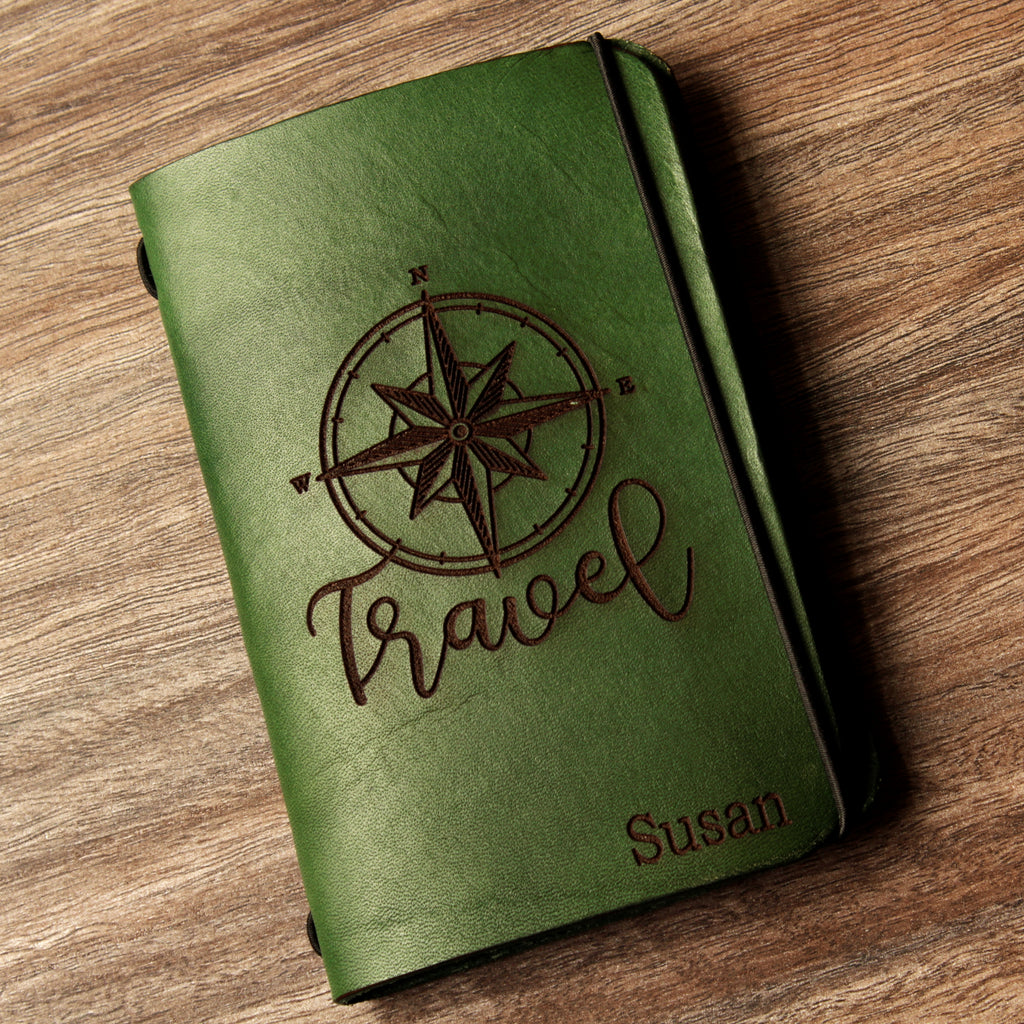 Personalized brown full-grain leather passport cover with laser engraved Vacation Mode On design, elastic band closure, and custom name Nicole engraved at bottom corner.
